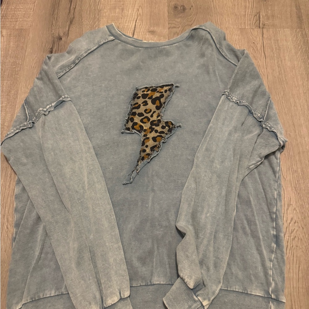 Easel Blue Sweatshirt with Leopard Print Lightning Bolt